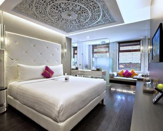 L Hotel Seminyak - North Kuta - חדר שינה
