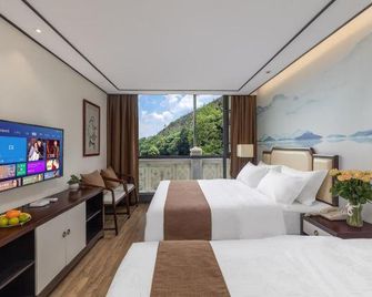 Qinghuyuan Boutique Homestay (Guilin Liangjiang Sihu Railway Station) - Guilin - Habitación