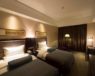 Shanxi Quanjin Business Hotel - Taiyuan - Habitación