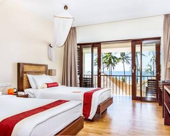 Eskala Hotels and Resorts - Ngwesaung - Schlafzimmer