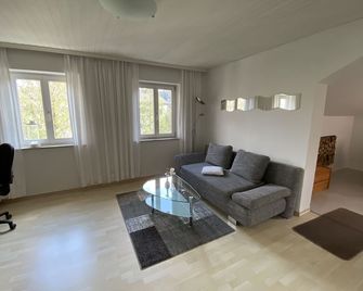 Vacation apartment Am Franziskanergarten 'Apartment Herzogstand' - Bad Tolz - Huiskamer