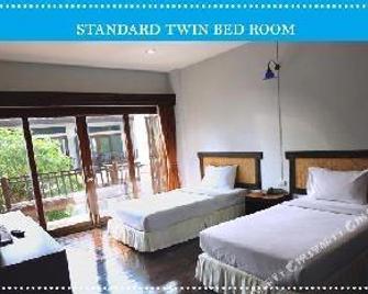 Vijitnakorn Nonpak Hotel - ศรีสะเกษ - ห้องนอน