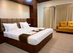 Unnati Stays Inn, Vijayapur - Bijapur - Schlafzimmer