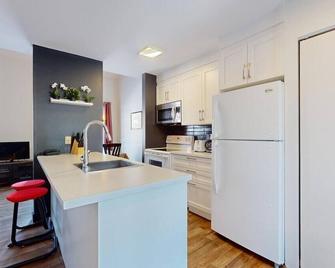 P-71: 2-bedroom mezzanine condo - Beaupre - Kitchen