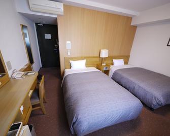 Hotel Route-Inn Oita Ekimae - Ōita - Yatak Odası