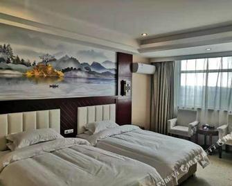 Yarui Holiday Garden Hotel - Suizhou - Bedroom