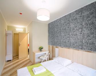 أوربان هوتل - لفيف - غرفة نوم