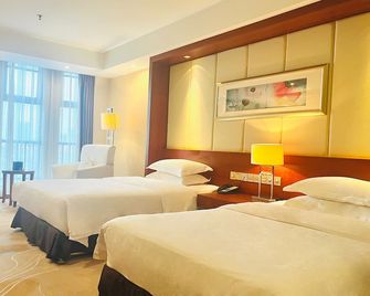 Grand Metropark Hotel Shangqiu - Shangqiu - Slaapkamer