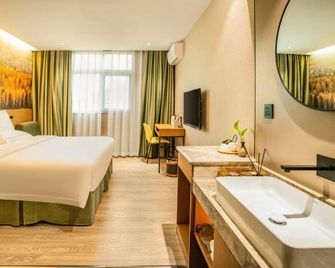 Qiankunrun Boutique Hotel (Meizhou Jiangbei) - Meizhou - Bedroom