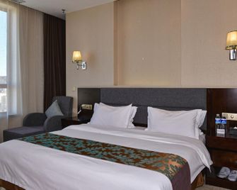 Oriental Lido Business Hotel - Huludao - Habitación