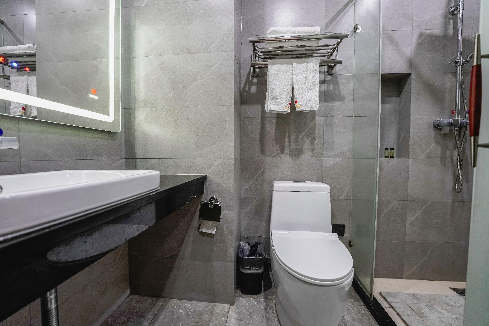 Iu Hotel Nanchang West Railway Metro Station - נאנצ'אנג - חדר שינה