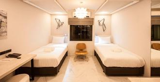 We Terminal Hotel - Chiang Mai - Camera da letto