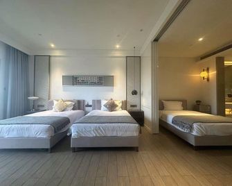 Sanya Cloud View Resort Apartment (Rock Platinum Branch) - Sanya - Schlafzimmer