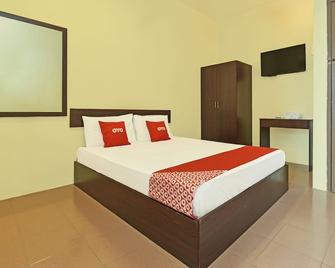 Spot On 89907 Motel Impian - Lumut - Ložnice