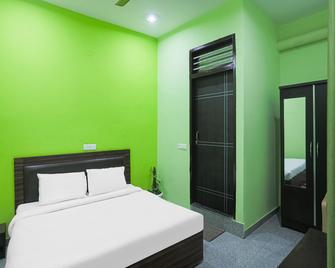 Capital O A-one - Manesar - Bedroom