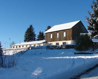 Groepsverblijf Snowview Lodge - Medendorf - Edificio