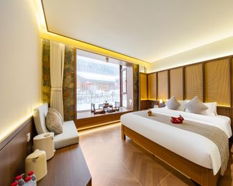 Floral Hotel·Dream Home Hotel(Xueyun Street Branch) - Mudanjiang - Camera da letto