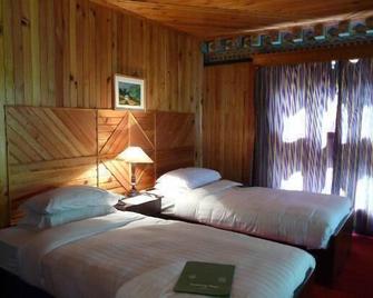 Olathang Hotel - Paro - Bedroom
