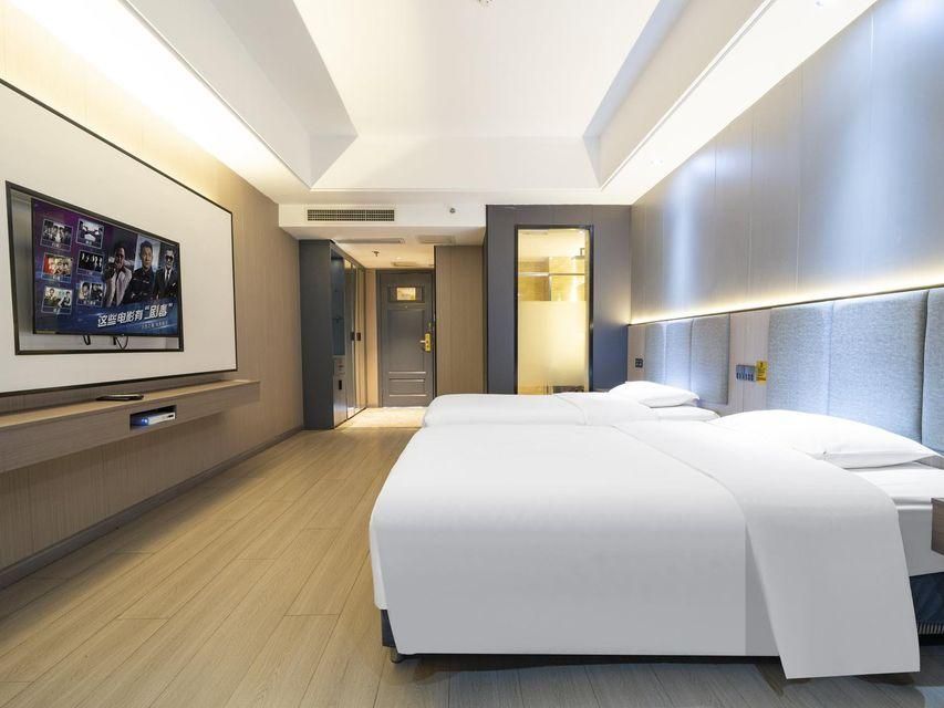 Fengqi City Hotel - Guangyuan - Bedroom