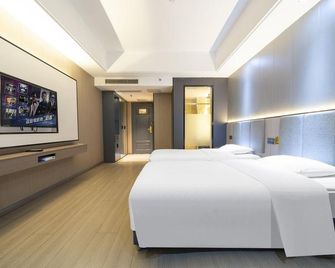 Fengqi City Hotel - Guangyuan - Habitación