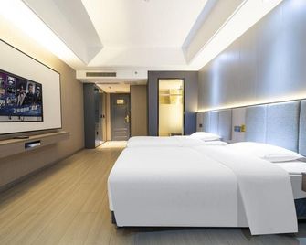 Fengqi City Hotel - Guangyuan - Bedroom