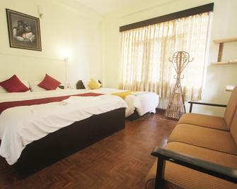 Hotel M&D Suites - Pokhara - Slaapkamer