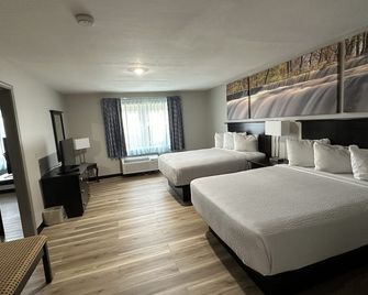 Days Inn and Suites by Wyndham Sikeston - Sikeston - Camera da letto