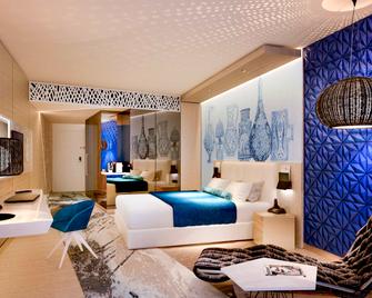 Mövenpick Hotel and Apartments Ghala Muscat - Muscat - Phòng ngủ