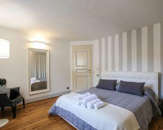 B&B Le Logge Luxury Rooms - סיינה - חדר שינה