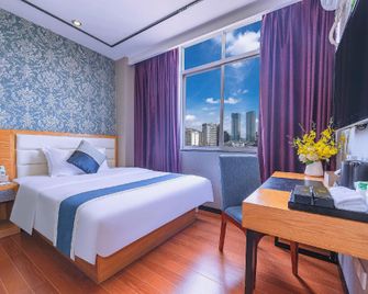 Jintone Hotel Nanning Jinhu Branch - Nanning - Bedroom