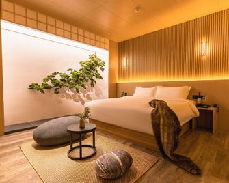 Weili Royal (Guangzhou Huadu Plaza Shuguang Road Branch) - Guangzhou - Bedroom