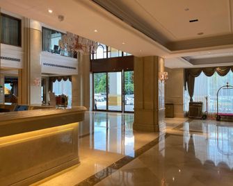 Vienna International Hotel Guangdong Zhanjiang High-speed Railway West Station - Zhanjiang - Lobby