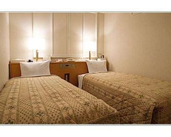 Hotel Shin-ei - Toyota - Bedroom