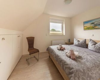 Modernes Ferienhaus mit Sauna in Wiek am Meer - Wiek - Slaapkamer