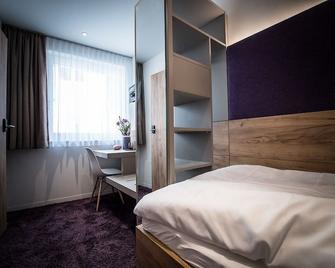 Hotel Restaurant Kochschule Rössle - Elzach - Slaapkamer