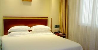 Greentree Inn Jining Jiaxiang County Jianshe South Road Express Hotel - Jining - Bedroom