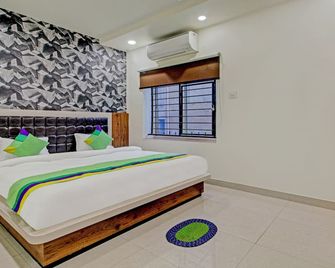 Treebo Golden Heights - Jamshedpur - Bedroom