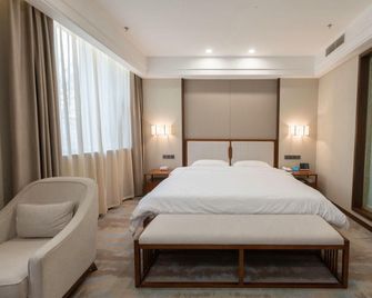 Yijing Holiday Hotel (Yimeng Road Branch) - Linyi - Bedroom