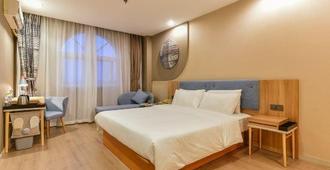 Home Inn (Liuzhou Liunan Wanda Plaza) - Liuzhou - Bedroom