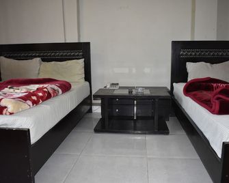 Hotel Islamabad Metro Inn - Rawalpindi - Bedroom