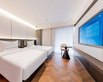 Mr.Jin Hotel - Baotou - Bedroom