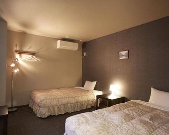 Quincys Inn Toyohashi - Тойохасі - Спальня