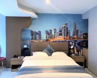 Baiyou Boutique Homestay (Taiyuan South Railway Station Airport) - Taiyuan - Schlafzimmer