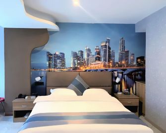 Baiyou Boutique Homestay (Taiyuan South Railway Station Airport) - Taiyuan - Schlafzimmer
