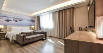 Atour Hotel Dalian Zhongshan Plaza - Dalian - Bedroom