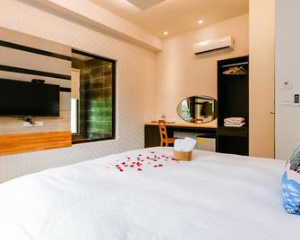 Ruo Shui Hotspring Hotel - Jiaoxi - Habitación