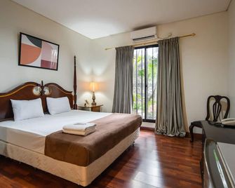 كوف أريمبي - جاكرتا - غرفة نوم