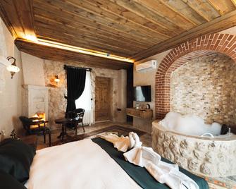 Cappadocia Bloom Hotel - Uchisar - Schlafzimmer