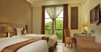 Hotel On The Rock - Kupang - Schlafzimmer