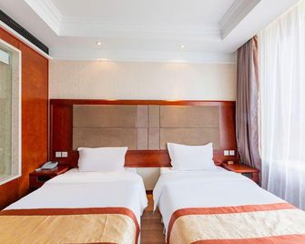 Guotou Health Care Center Hotel - Dalian - Bedroom